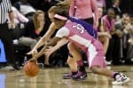 wbball_vs_JMU_2_12_12_#_72 Christina Carter wrestles after a loose ball against JMU Sunday afternoon. (Chris Conway/CT)